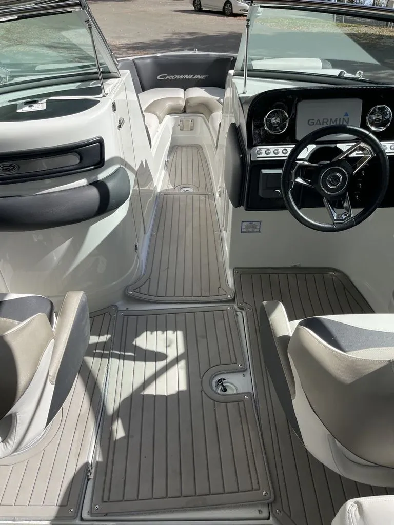 Slide: The Image of Interior of a 2022 Crownline 265 SS boat with Garmin display. - 2