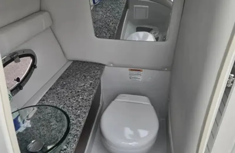 Slide: The Image of Luxurious bathroom in Crownline 265 SS boat, 2022 model. - 6