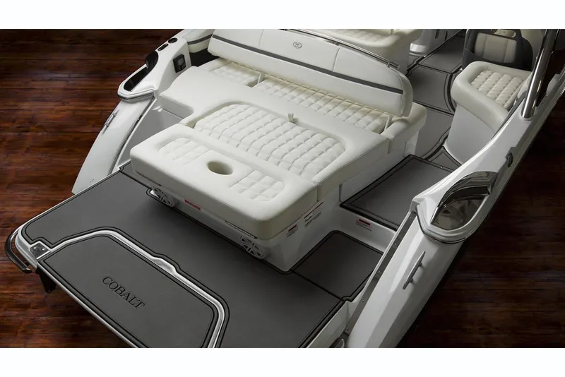 Slide: The Image of Manufacturer Provided Image: 2019 Cobalt R5 boat interior with white cushioned seating and teak flooring. - 16