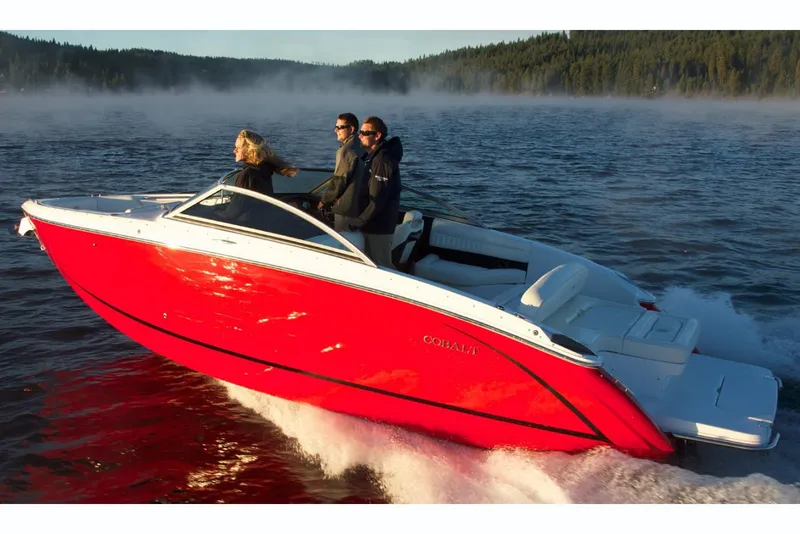 Slide: The Image of Manufacturer Provided Image: 2019 Cobalt R5 boat cruising on a lake with passengers. - 6