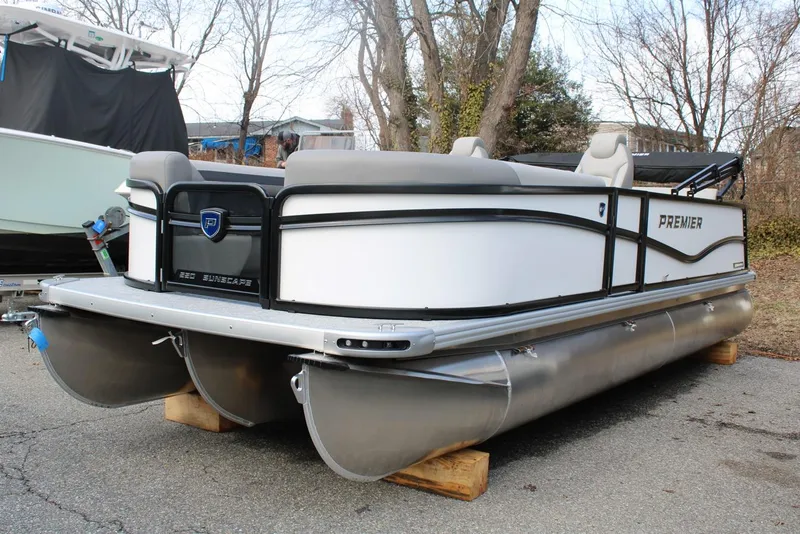 The Image of 2026 Premier 220 Sunscape RL - CL pontoon boat on display outdoors. - 0