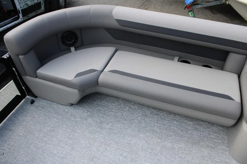 Slide: The Image of Luxurious seating on 2026 Premier 220 Sunscape RL - CL pontoon boat, featuring gray upholstery. - 10