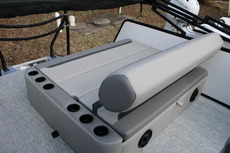 Slide: The Image of 2026 Premier 220 Sunscape RL - CL boat seating with cup holders and speakers. - 3