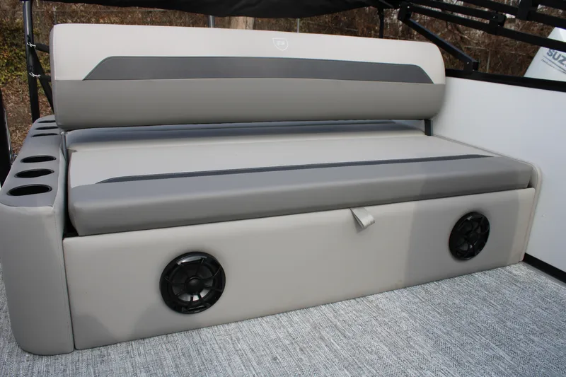 Slide: The Image of Premier 220 Sunscape RL - CL 2026 boat seating with integrated speakers and cup holders. - 6