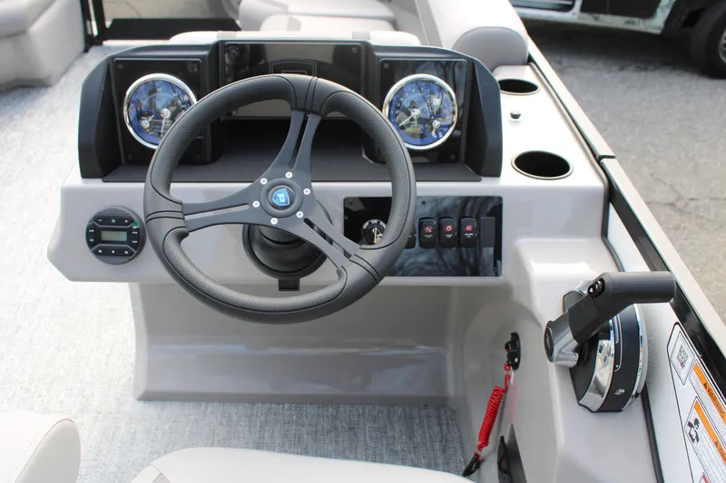 Slide: The Image of Steering console of 2026 Premier 220 Sunscape RL - CL boat with modern controls. - 7
