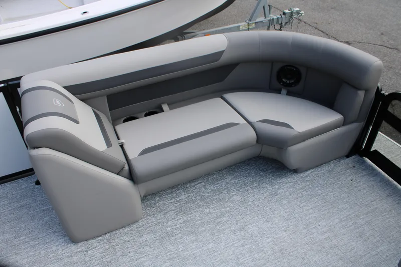 Slide: The Image of 2026 Premier 220 Sunscape RL - CL boat seating, featuring sleek gray upholstery. - 9