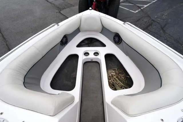 Slide: The Image of 2006 Supra Launch 20 SSV boat interior with cushioned seating and storage space. - 29