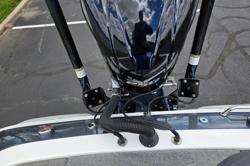 Slide: The Image of 2015 Skeeter FX20 boat with Yamaha engine, parked on asphalt. - 28
