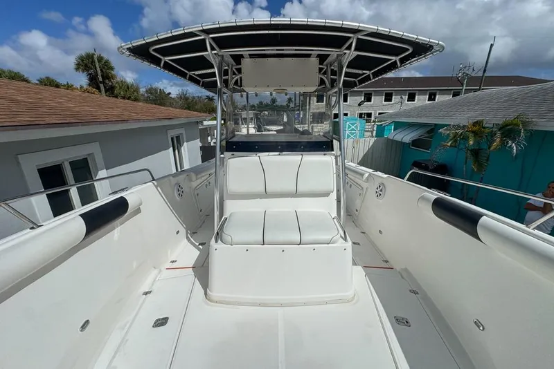 Slide: The Image of Century 3200 Center Console boat, 2000 model, featuring spacious seating and sleek design. - 100