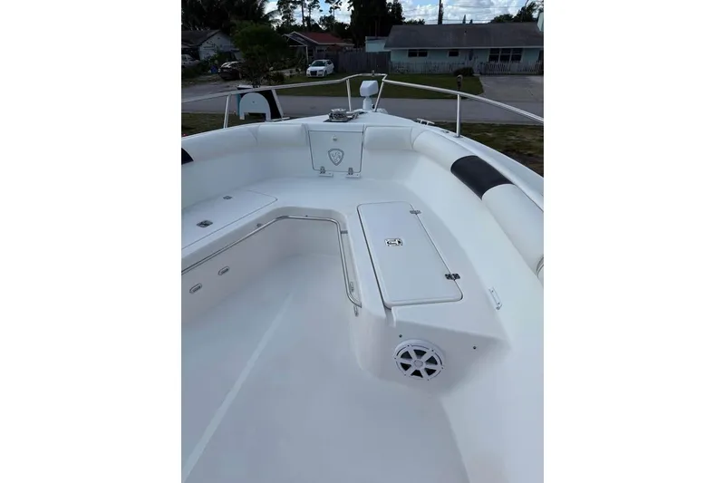 Slide: The Image of Aerial view of a 2000 Century 3200 Center Console boat with dual engines. - 13