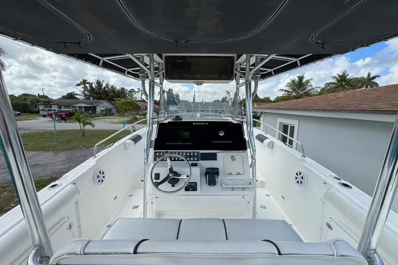 Slide: The Image of 2000 Century 3200 Center Console boat interior with steering wheel and controls. - 27