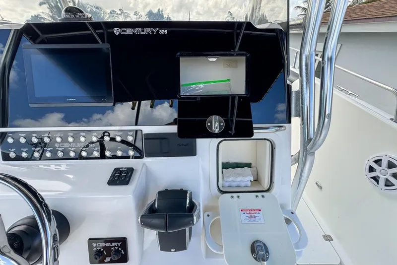 Slide: The Image of Century 3200 Center Console 2000 dashboard with controls, displays, and storage compartments. - 33