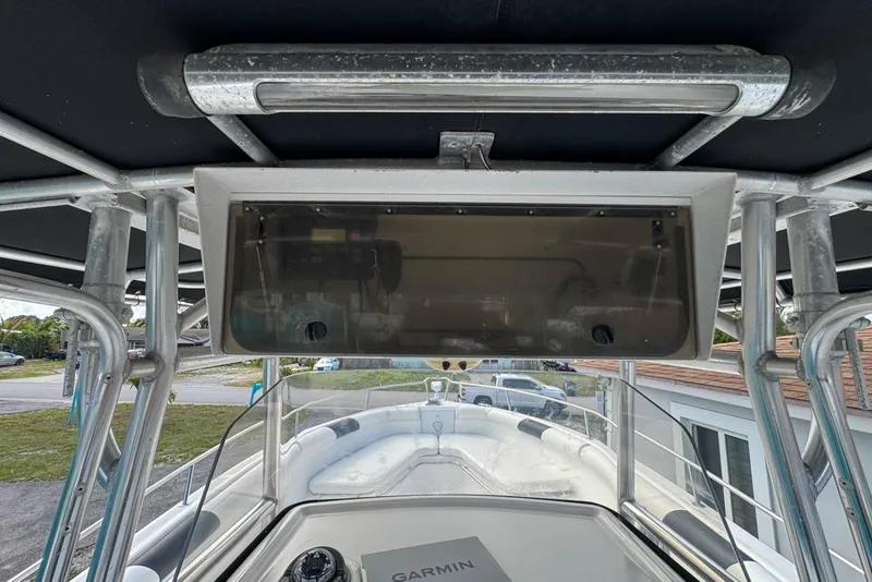 Slide: The Image of 2000 Century 3200 Center Console boat interior with Garmin navigation system. - 35