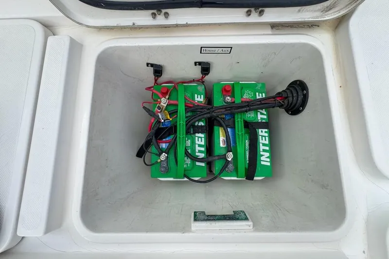 Slide: The Image of Battery compartment of a 2000 Century 3200 Center Console boat with Interstate batteries. - 45