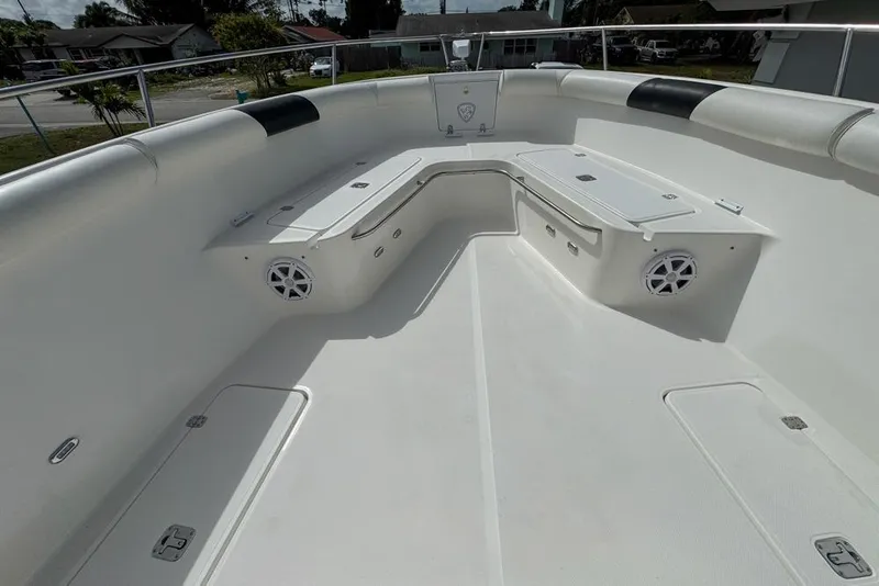Slide: The Image of 2000 Century 3200 Center Console boat interior with seating and storage compartments. - 78