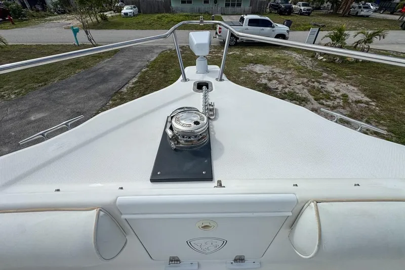 Slide: The Image of Bow view of a 2000 Century 3200 Center Console boat with anchor winch. - 93