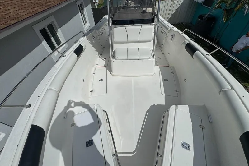 Slide: The Image of 2000 Century 3200 Center Console boat interior with seating and storage compartments. - 97