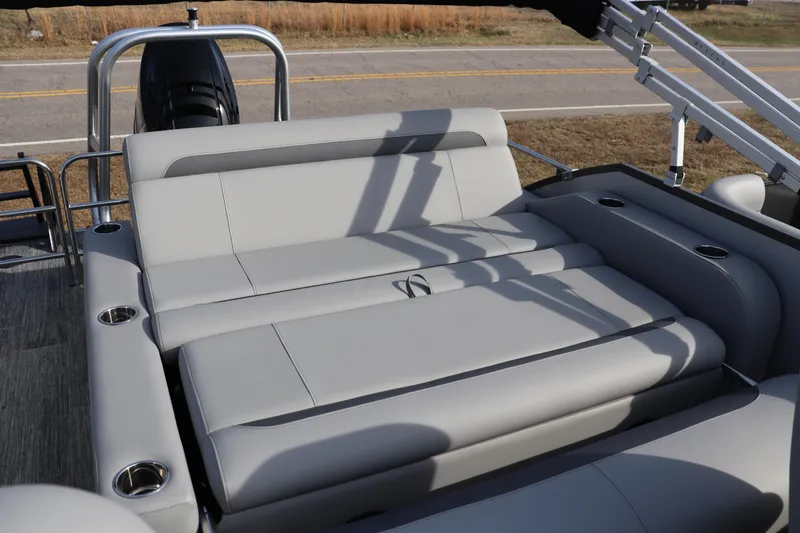 Slide: The Image of 2026 Bentley Pontoons Legacy 223 Swingback with luxurious seating and cup holders. - 8