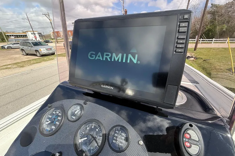 Slide: The Image of Garmin display on 2020 Excel 203 Bay Pro boat dashboard with gauges. - 16
