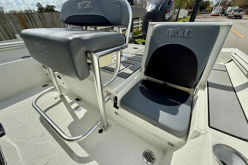 Slide: The Image of 2020 Excel 203 Bay Pro boat seats with logo, featuring sturdy metal frames. - 7