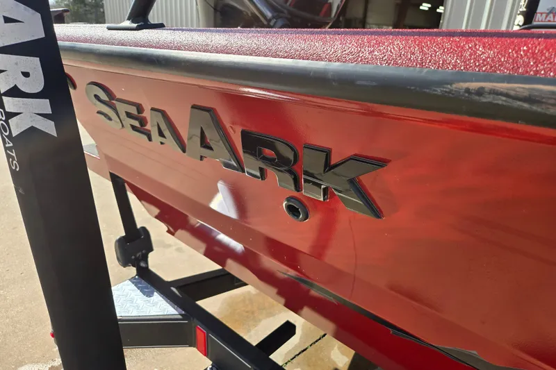 Slide: The Image of Red 2023 SeaArk ProCat 240 boat with bold logo on the side. - 22