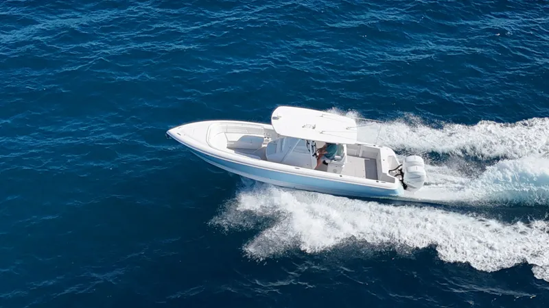 Slide: The Image of Aerial view of a 2019 Intrepid 327 boat on the ocean. - 21
