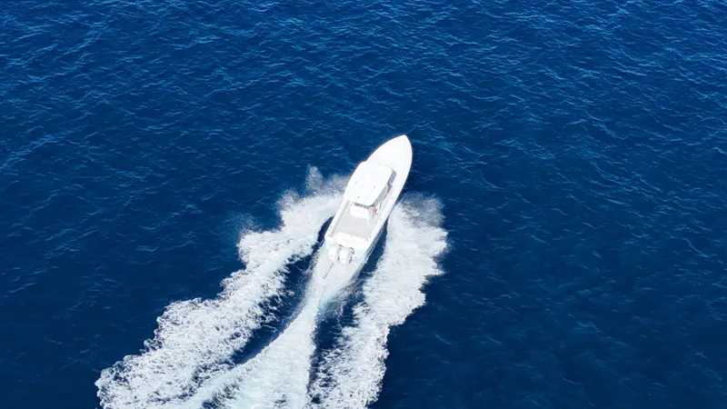 Slide: The Image of 2019 Intrepid 327 boat cruising on open sea. - 22