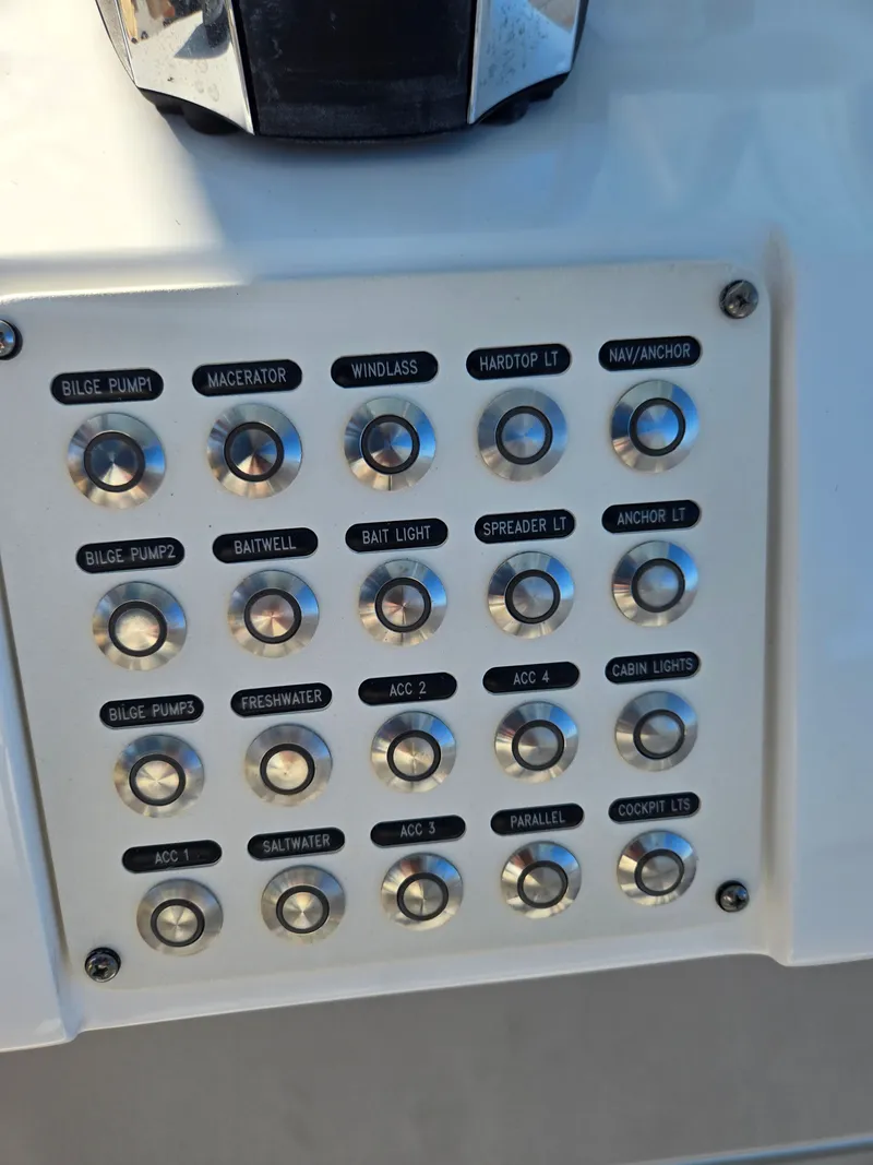 Slide: The Image of Control panel of a 2019 Intrepid 327 boat. - 24