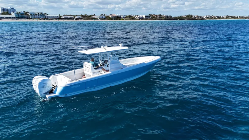 Slide: The Image of 2019 Intrepid 327 boat on open sea. - 4