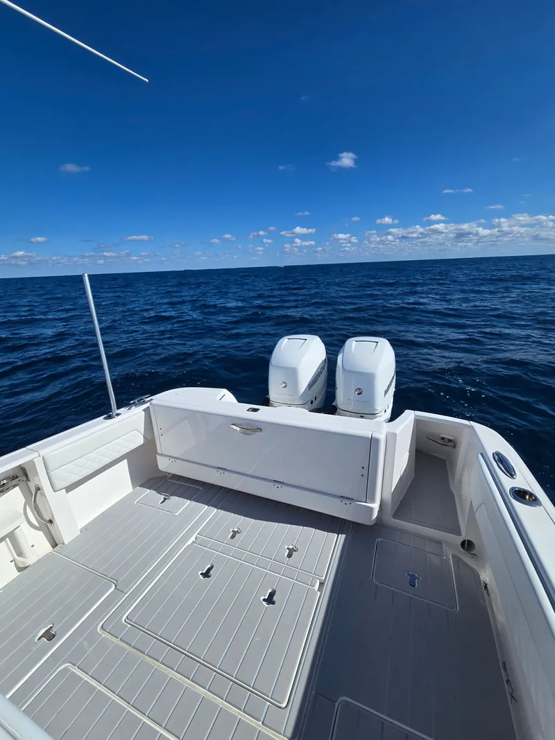 Slide: The Image of 2019 Intrepid 327 boat on open sea. - 7