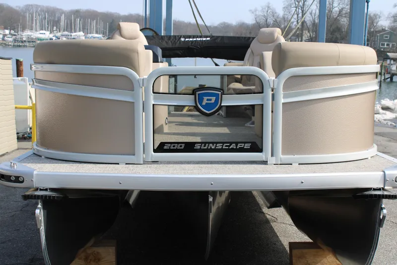 Slide: The Image of 2026 Premier 200 Sunscape RF - CL pontoon boat, rear view at dock. - 2