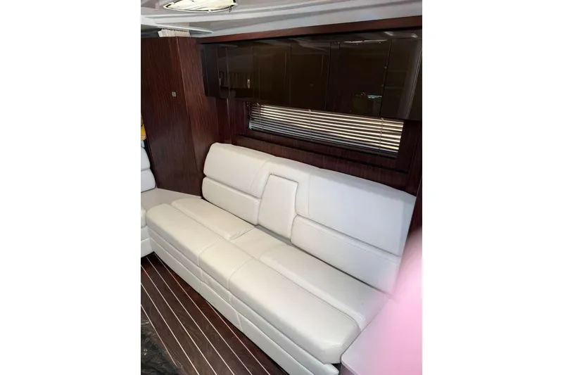 Slide: The Image of Luxurious interior of 2018 Monterey 335 Sport Yacht with white leather seating. - 9