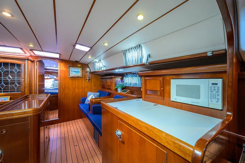 Slide: The Image of Luxurious interior of 2003 Beneteau 50 yacht with wood finish and modern amenities. - 66