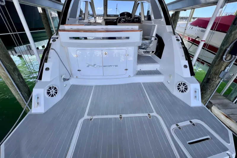 Slide: The Image of 2024 NX Boats 370 HT yacht interior with sleek design and modern features. - 14
