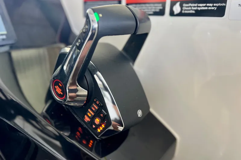 Slide: The Image of Throttle control of 2024 NX Boats 370 HT, featuring advanced navigation technology. - 39