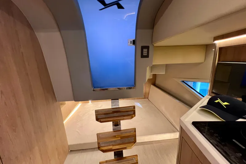 Slide: The Image of Interior of 2024 NX Boats 370 HT, featuring modern design and wooden accents. - 71