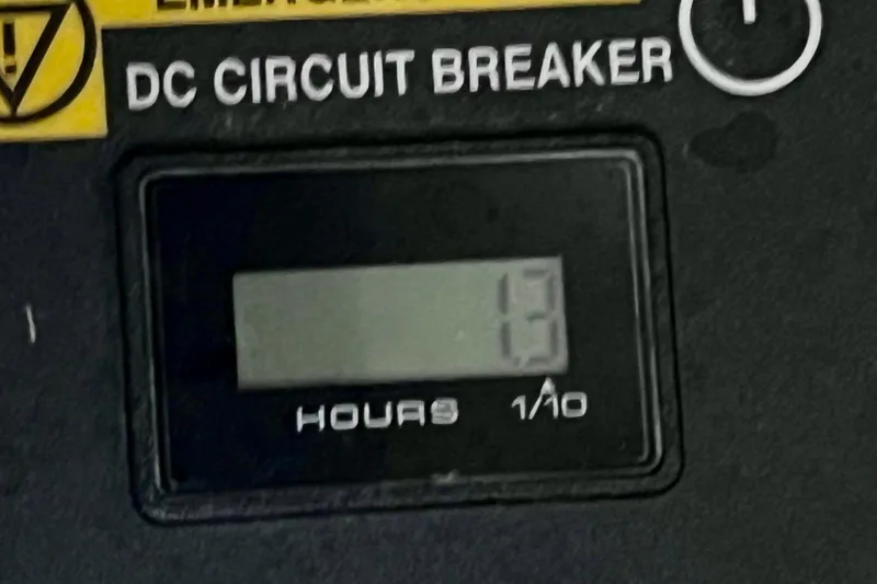 Slide: The Image of DC circuit breaker display showing 13 hours on NX Boats 370 HT, 2024 model. - 87
