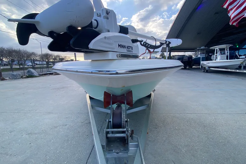 Slide: The Image of 2018 NauticStar 215 XTS boat with Minn Kota Terrova motor on trailer. - 8