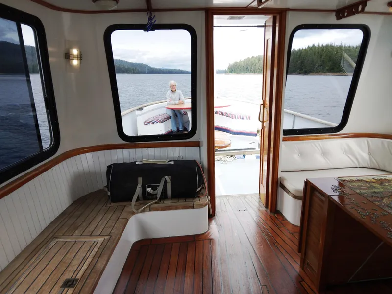 Slide: The Image of Interior of 1983 Thackwray Custom Pilothouse Motorsailer with scenic ocean view. - 1
