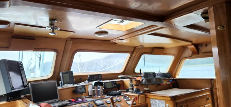 Slide: The Image of Pilothouse interior of 1983 Thackwray Custom Pilothouse Motorsailer with navigation equipment. - 7