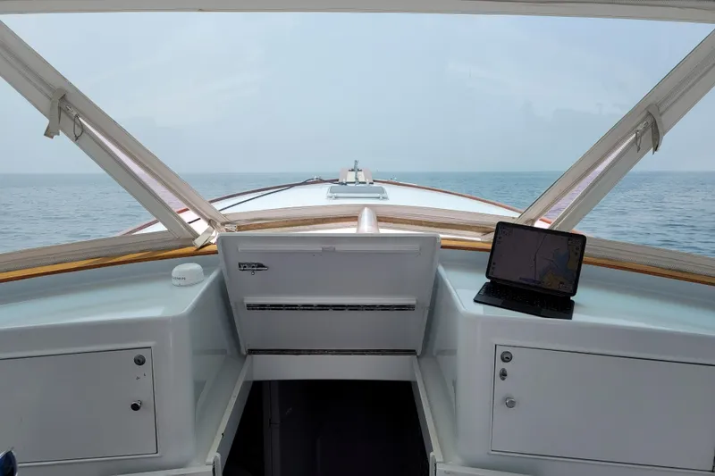 Slide: The Image of Cockpit view of 1984 Sunny Briggs 37 Express boat with ocean horizon. - 9