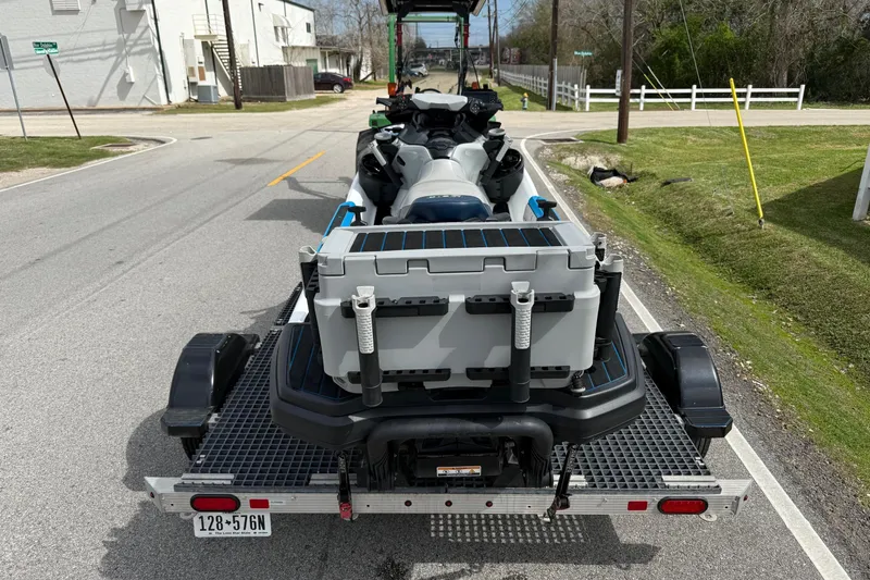 Slide: The Image of 2022 Sea-Doo FishPro Sport 170 on trailer, parked on a suburban street. - 3