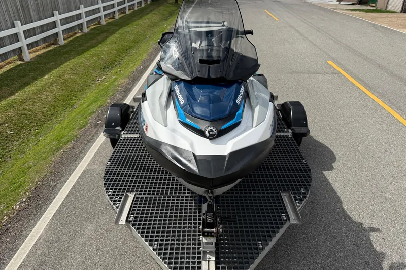 Slide: The Image of 2022 Sea-Doo FishPro Sport 170 on trailer, parked on road. - 6