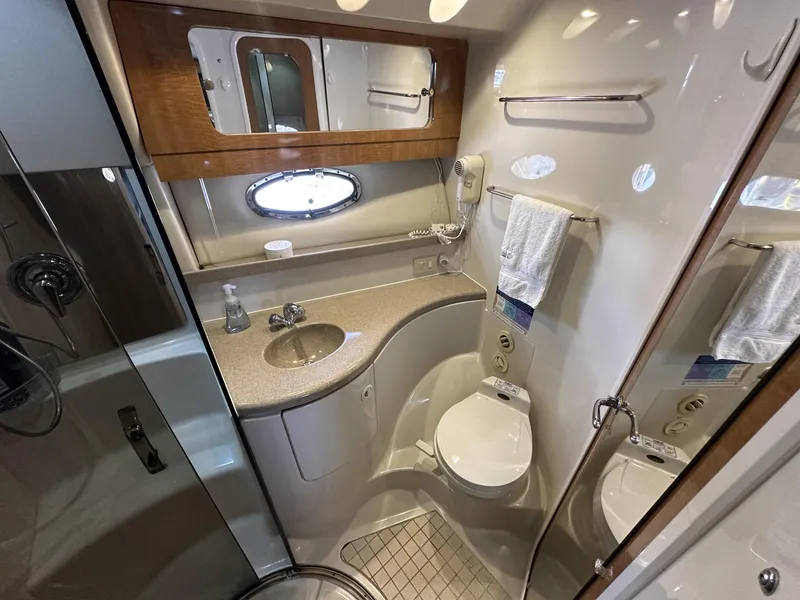 Slide: The Image of Luxurious 2002 Regal 3880 yacht bathroom with modern fixtures and elegant design. - 14