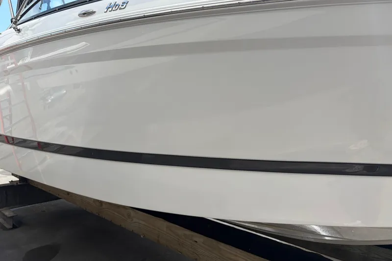 Slide: The Image of Four Winns HD3 boat hull on display, showcasing sleek design and craftsmanship. - 7