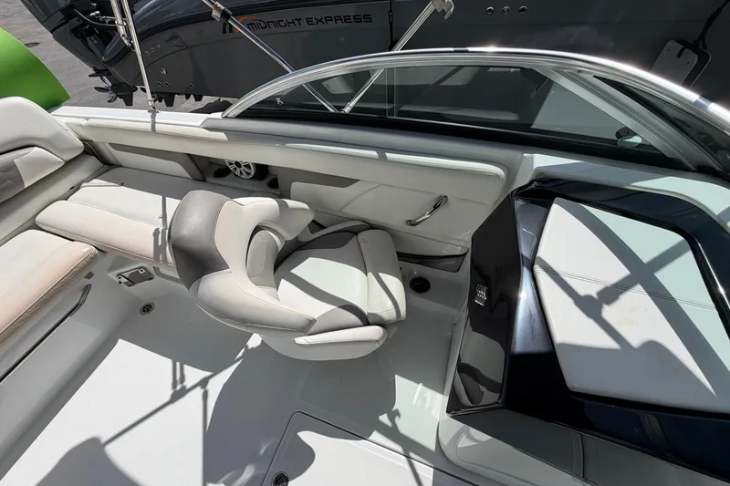 Slide: The Image of Interior of Four Winns HD3 boat with seating and sleek design. - 9