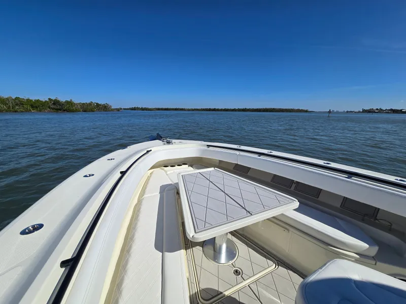 Slide: The Image of HCB 42 Siesta 2018 on calm waters with blue sky. - 10