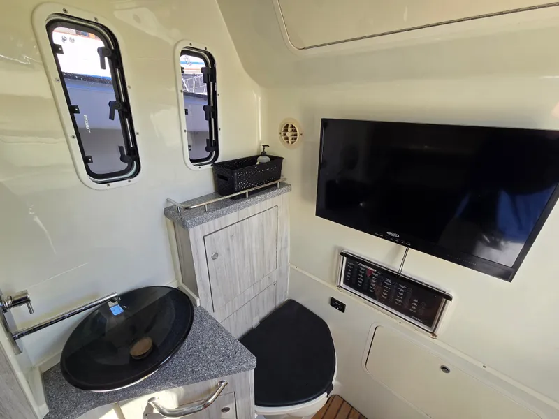 Slide: The Image of Interior of 2018 HCB 42 Siesta with sink and TV. - 23