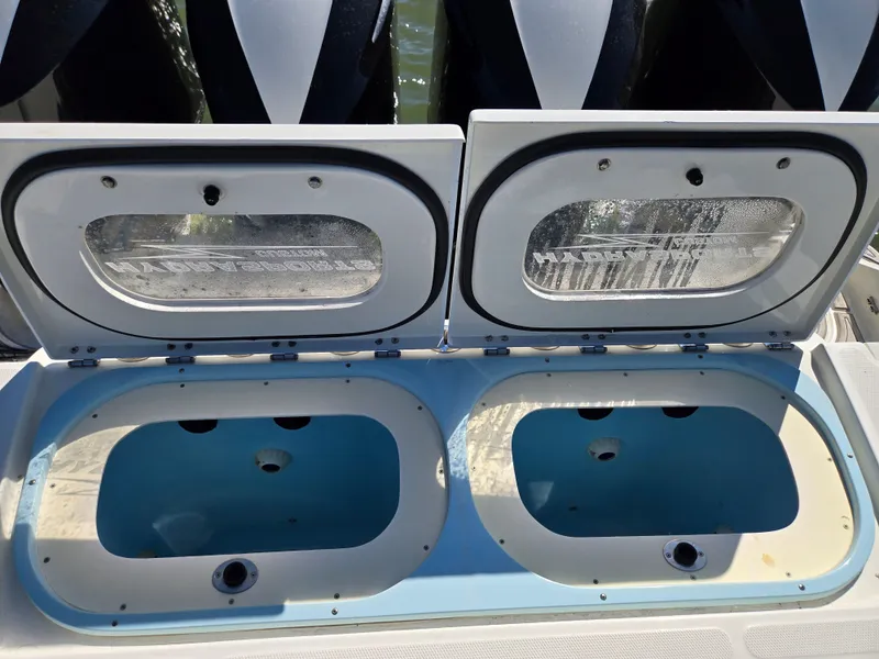 Slide: The Image of Open fish compartments on a 2018 HCB 42 Siesta boat. - 25