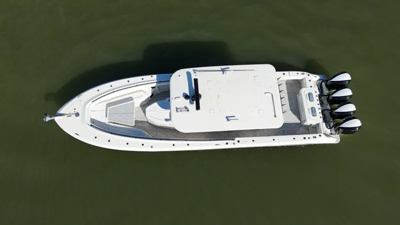 Slide: The Image of Aerial view of a 2018 HCB 42 Siesta boat on the water. - 4